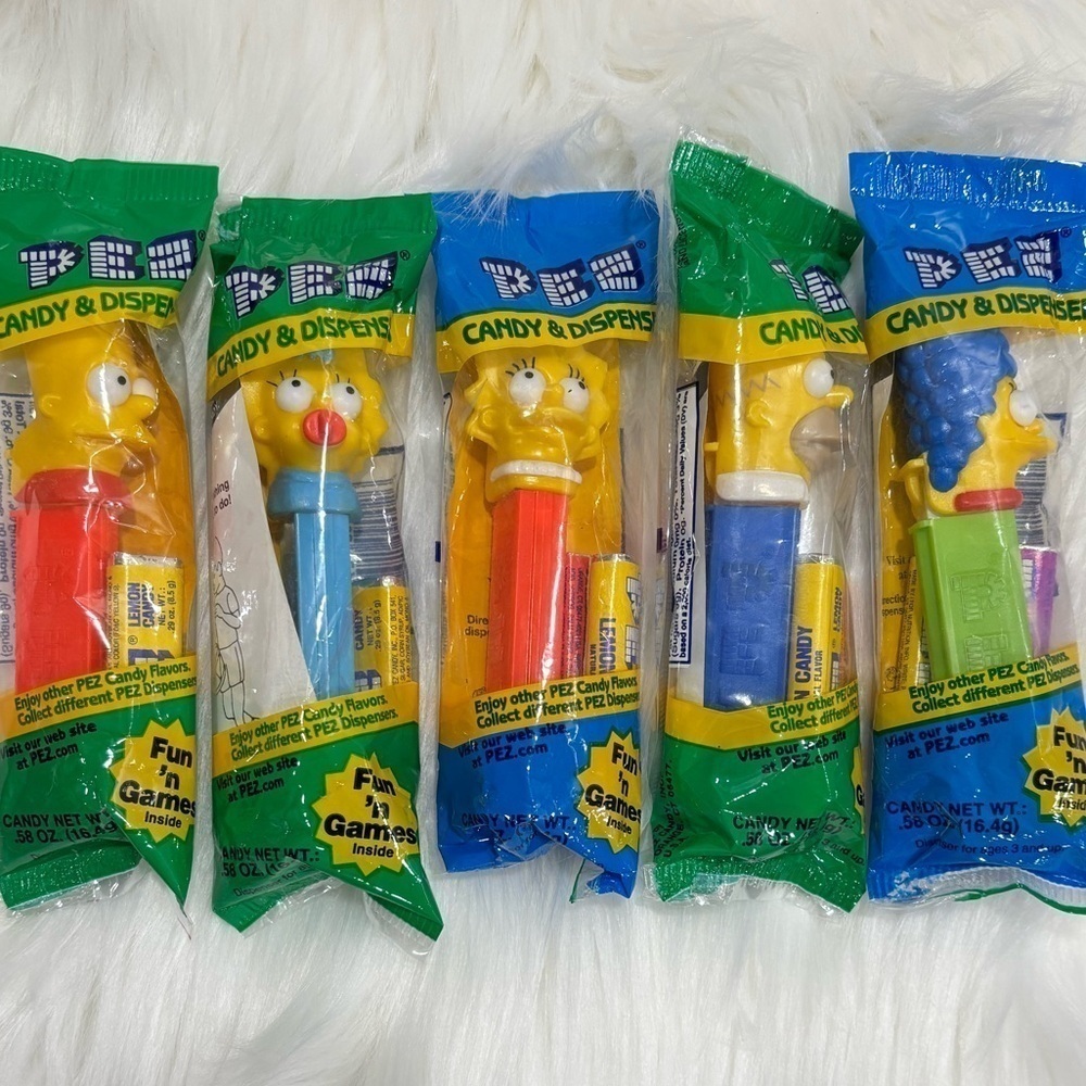 NEW RARE COLLECTIBLE PEZ Simpson peanuts Spider-Man Wonder Woman lot - Picture 2 of 3